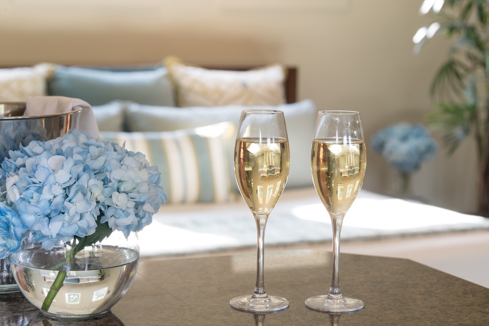 Guest room with champagne glasses at the ultimate couples getaway in Texas