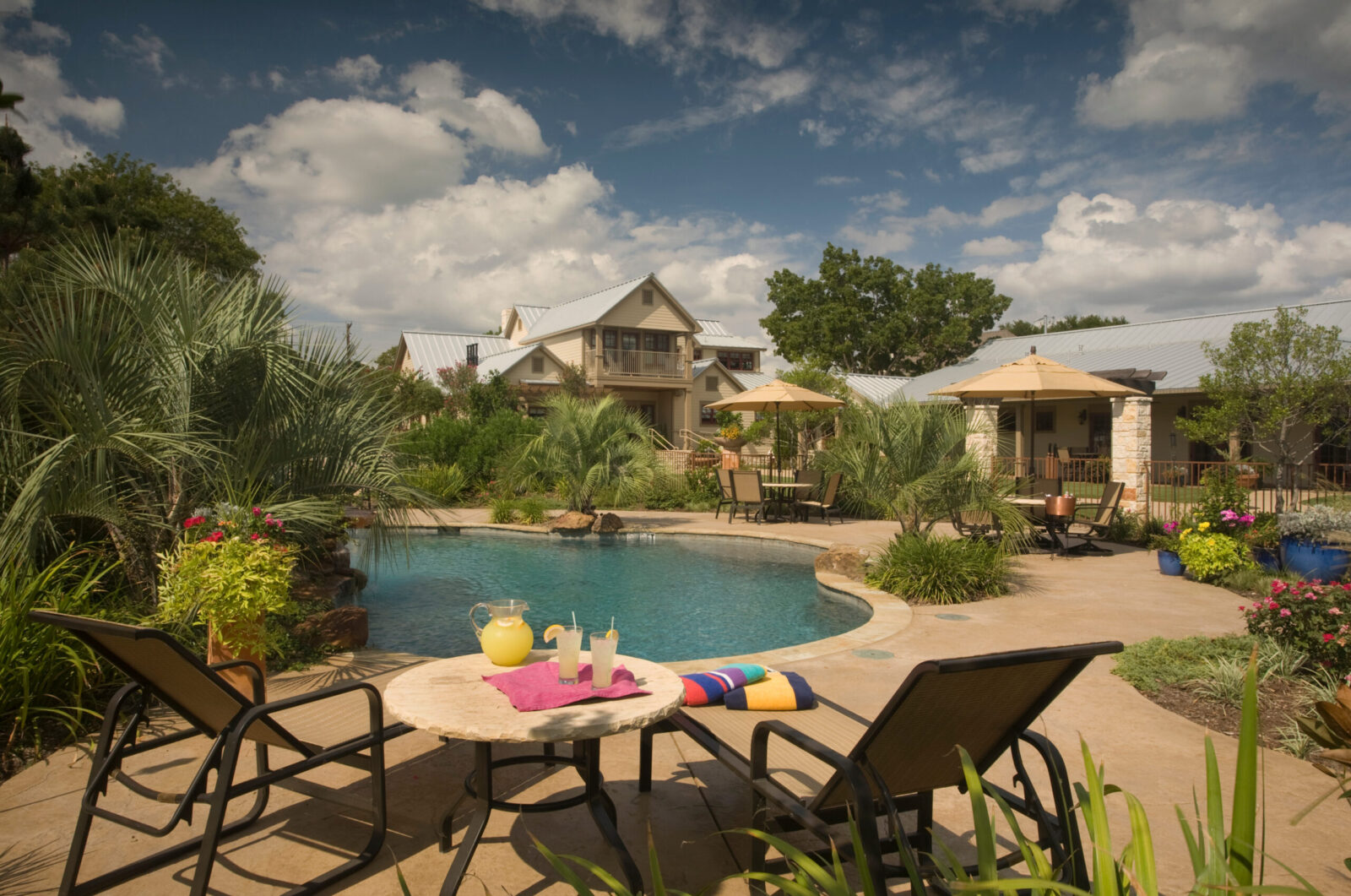 The saltwater pool at our hotel in Granbury Texas is surrounded by beautiful gardens.