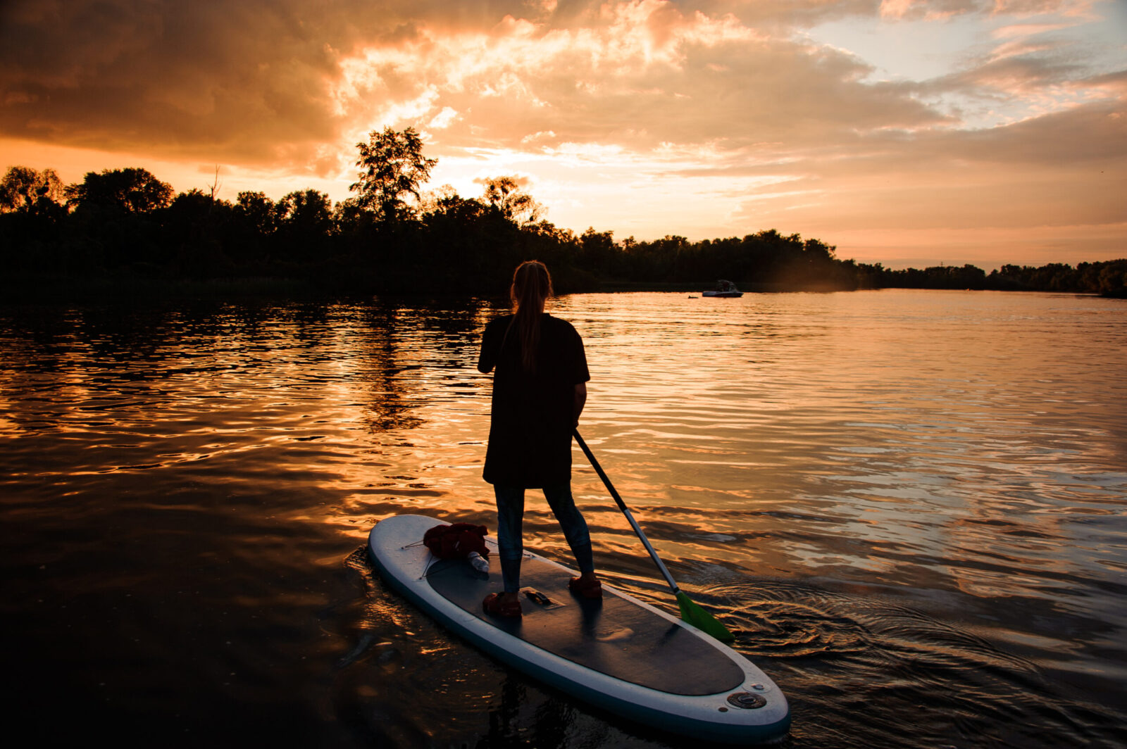 Paddleboarding on Lake Granbury is a great thing to do in Granbury TX, especially at sunset.